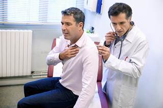 A middle-aged man with asthma, hypertension, and hyperlipidemia presents to the ED with dyspnea at rest. A middle-aged man with asthma, hypertension, and hyperlipidemia presents to the ED with dyspnea at rest.